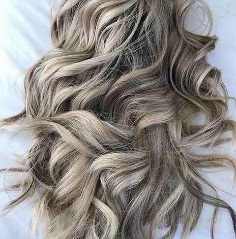 A close-up of gray balayage waves, colored at Red Market Miami